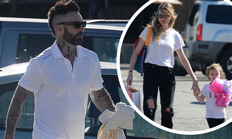 adam levine wife and daughters.